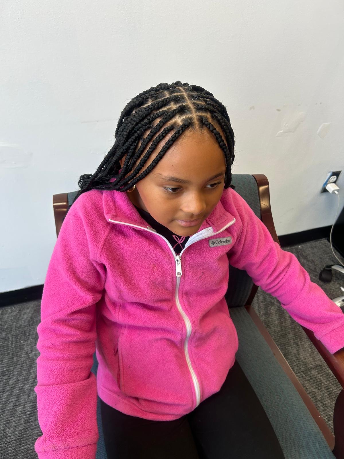 Braiding style by Chidalu African Braids