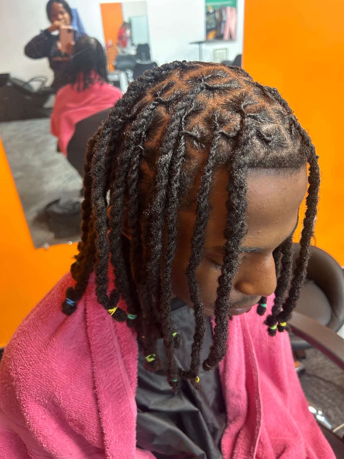 Braiding style by Chidalu African Braids